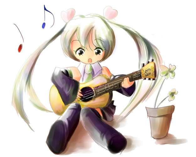 ギターを弾くミクちゃん