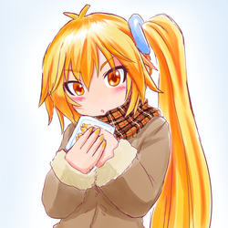 寒くてカイロを手に温めるネルさん